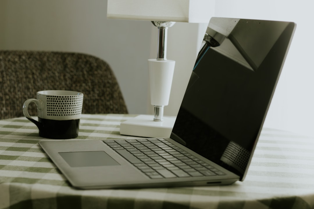 developer coding laptop coffee desk modern workspace