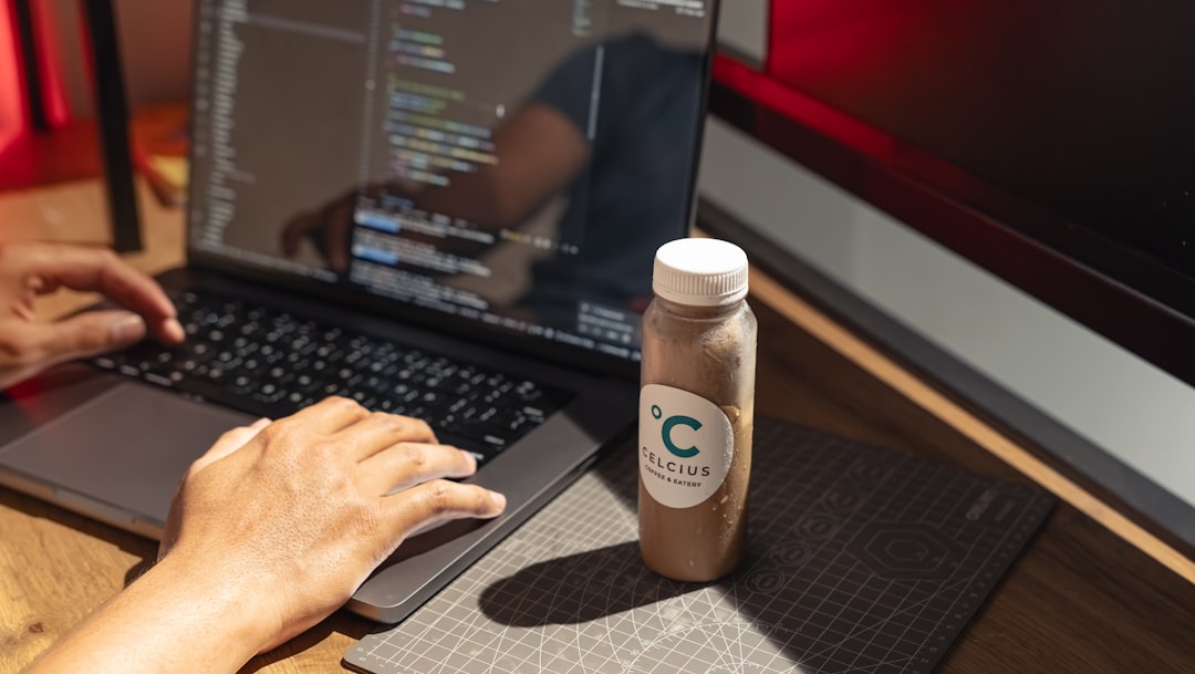 web developer coding laptop workspace modern office